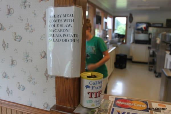 Every meal comes with cole slaw, macaroni, salad, potato salad or chips.  Note how clean the floor is there!