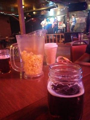 Popcorn pitcher, beer in a mason jar, good music complete with a reasonable cover, what more can one ask for?