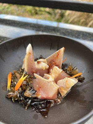 Albacore sashimi with garlic chili and black peppered collards