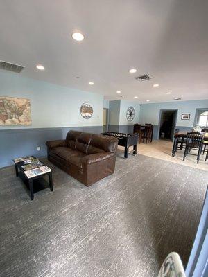 Lounge area with books, dvds, and info guides for local attractions. Came in a few times to play on the  soccer table with the kiddos.