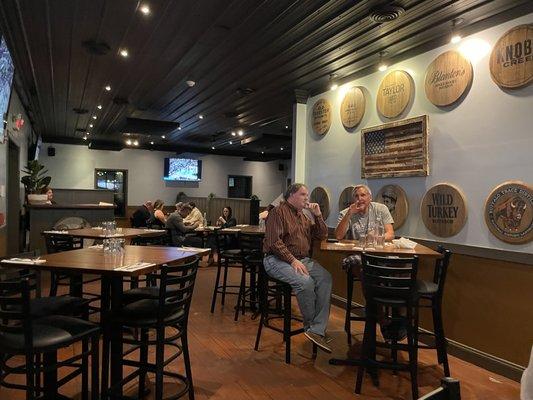 Main dining area with a few high tops.