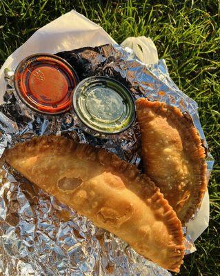 Empanadas with green sauce and red sauce