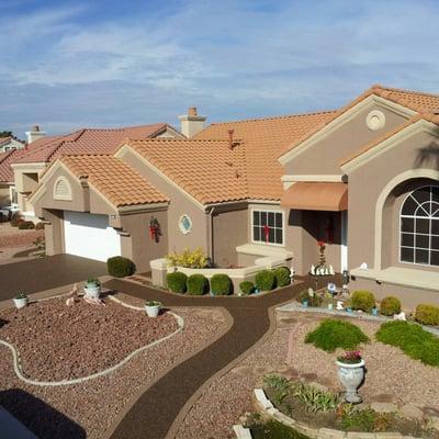 Driveway and walkway with Pebble Stone Coatings overlay. If you are looking for pavement repair visit www.pebblestonecoatings...