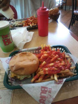 Cheeseburger and fries extra ketchup