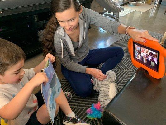 Nanny facilitating Zoom class during pandemic