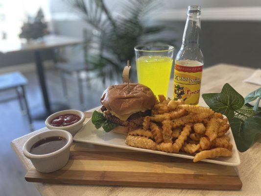 "Bourbon Jerk Burger" with Seasoned Fries and DG Pineapple Soda