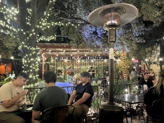 Band playing in outdoor restaurant