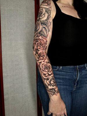 Black rose sleeve tattoo by Stephen Franciosa