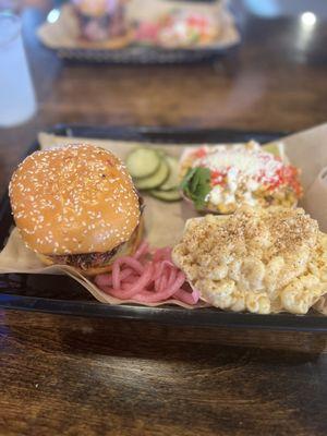 Brisket sandwich, hot street corn and Mac and cheese