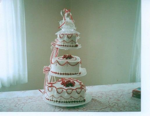 Heart shaped three tier wedding cake