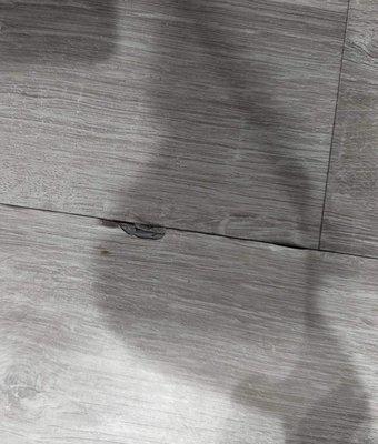 Rugworks flooring damaged