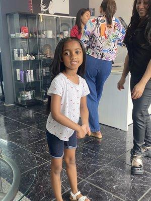 Child with hair straightened