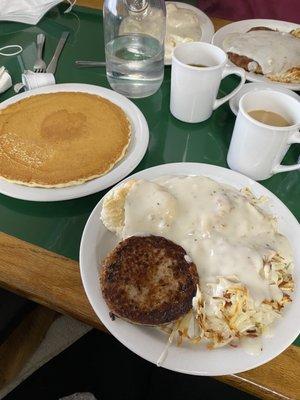 Sausage, biscuits & gravy, with hash browns and a hot cake