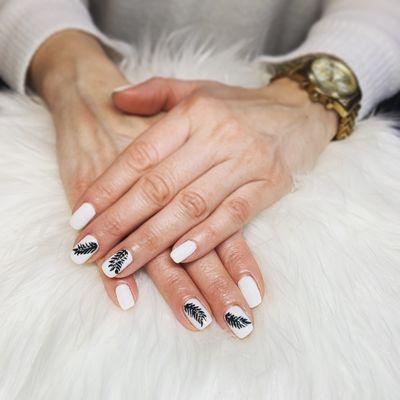 White with leaf nail designs