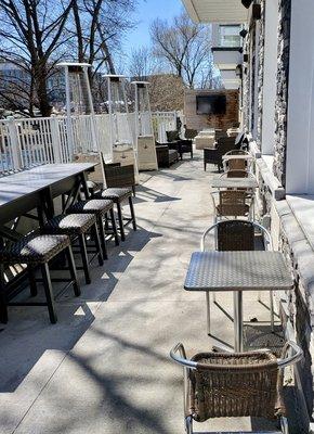 Outdoor patio dining with heaters for cooler evenings