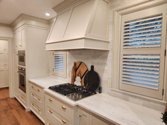 With a new kitchen comes new custom colored shutters to match.  Made in the USA Hunter Douglas Heritance Hardwood Shutters.