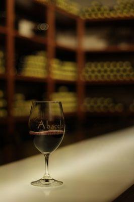 a glass of our flagship Tempranillo waiting to be tasted in our exclusive library room