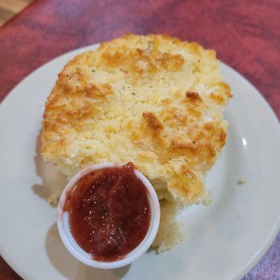 Giant homemade biscuit with strawberry jam