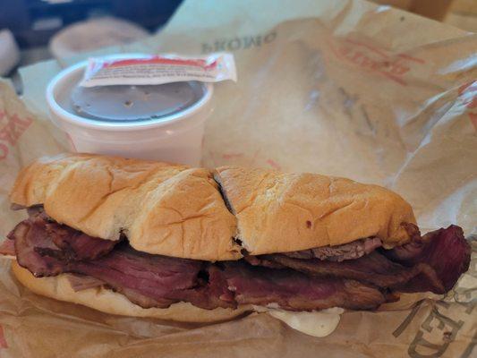 Brisket bacon and beef dip sandwich