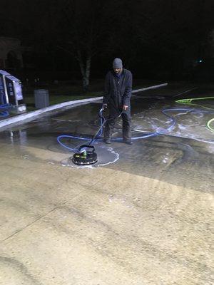 Pressure washing gas station