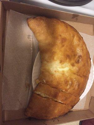 Now that is a calzone. They call that a small!