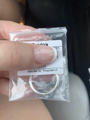 The ring with neither wrapping nor a bag.