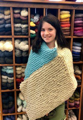 She completed her 1st poncho in 2 weeks!