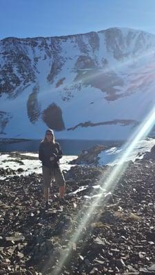 Kelly hiking in Treads 'n' Threads gear near Lake Irwin.