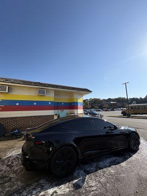 Spoiler install and exterior wash on this Tesla model S