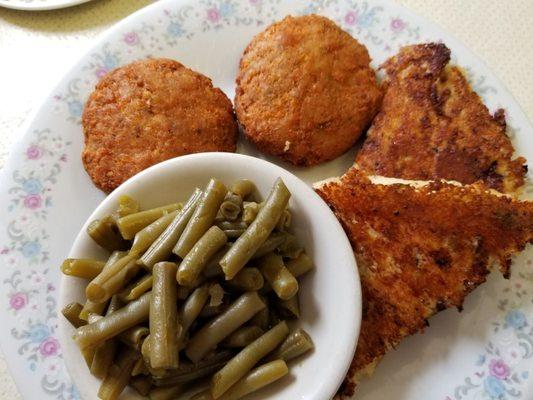 Salmon patties with cheese grits.