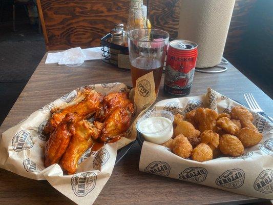 Wednesday wings with Vegas hot sauce , cauliflower bites and Alaska Amber. Yum!