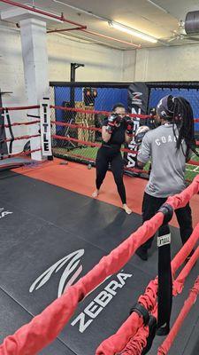 One-on-one boxing training session