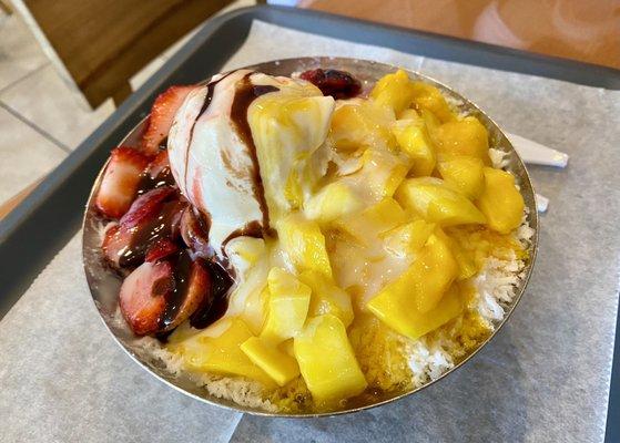 1/2 strawberry and 1/2 mango bingsoo. Artificial tasting and overly sweet. Not worth $12.