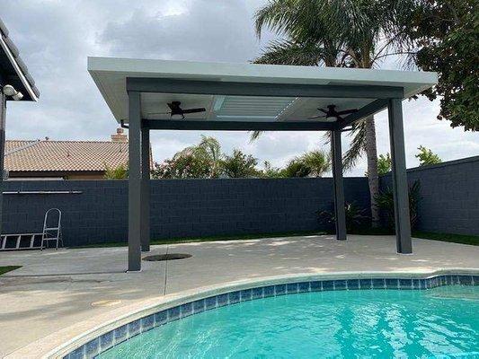 Freestanding combo patio with equinox louvers and electrical.