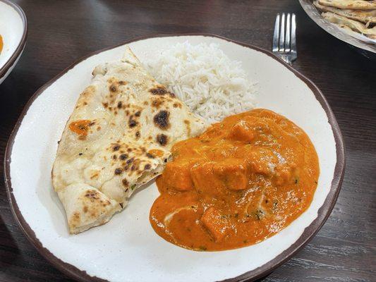 My plate - butter chicken, butter naan bread, basmati rice.