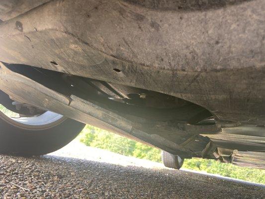 Undercarriage damage done by Bandit Towing