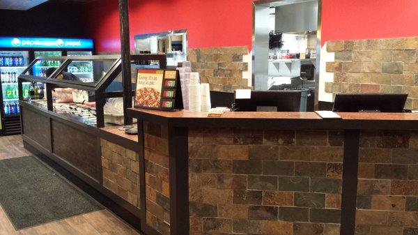 New, modern counter for ordering and grazing the salad bar.