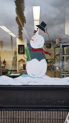 December 2020 Snowman painted on the window by ELF Designs