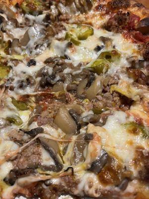 Jalapeño, mushrooms and sausage pizza (after I removed half the jalapeños)