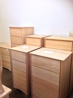 Lots of dresser drawers. Unfinished quality material.