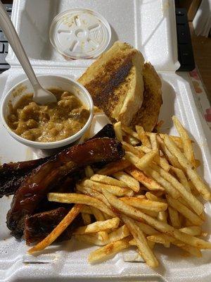 4 Ribs and Fries w/ Baked beans and Garlic Bread