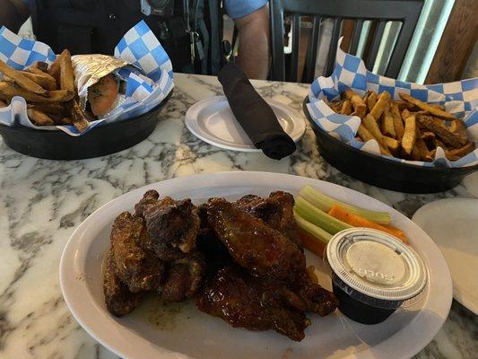 Chicken wings and hand cut fries. Yummy!!