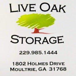 Live Oak Storage business logo with a tree element and black text