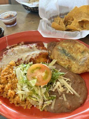 Enchilada, rice beans, and a chili Romano