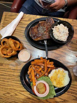 Ribeye and mashed potato, onion rings, honey black jack burger and sweet potato fries