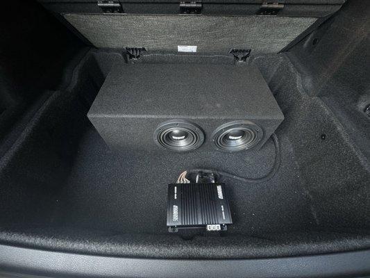 2 - Sundown Audio 6.5 U series Subwoofers in a groundshaker ported enclosure tuned to 32hz.