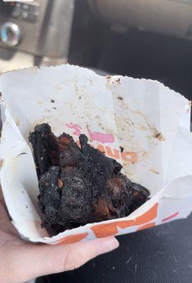 Completely charred bacon