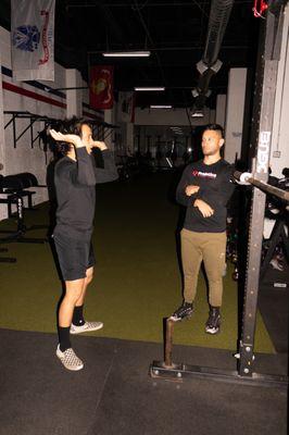 Collaborating with other fitness professionals on proper biomechanics and lifting form.