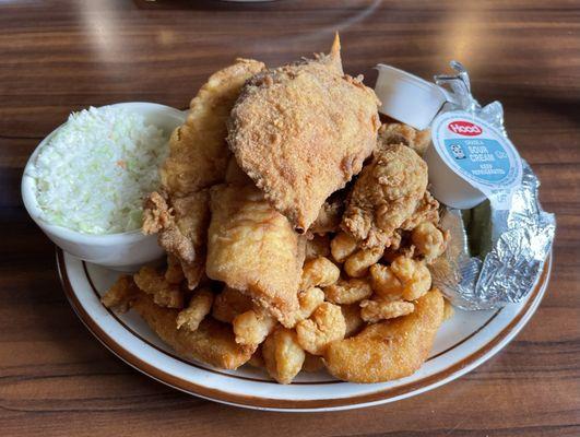 Captain's Platter (popcorn shrimp, flounder filet, oysters, deviled crab, hush puppies, baked potato, coleslaw)