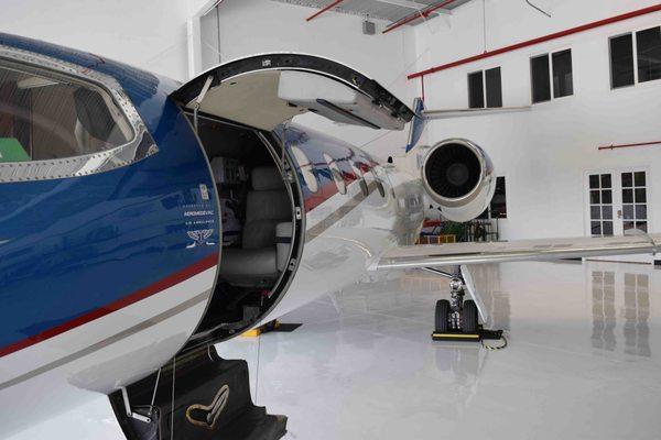 Aeromedevac Air Ambulance jet plane docked in hanger